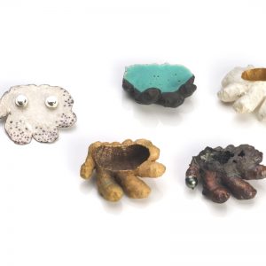 <strong>Art Jewellery by Young Talents 2004</strong><br>Four »Ginger« brooches, copper, silver, <strong>Sam Tho Duong</strong>, Pforzheim, 2004<br><span class="fotocredits">Photo: Petra Jaschke</span>
